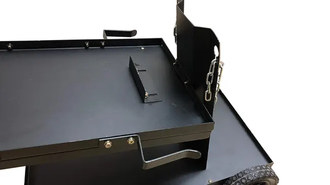 Detail of the Metal Man UWC2XL Universal Welding Cart shelf with a chain and pull-out drawer handle, on a white background.