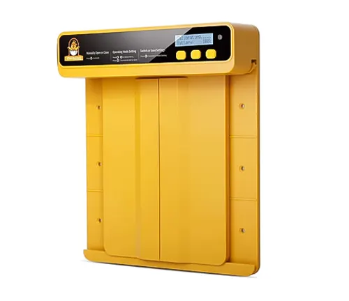 Yellow automatic chicken coop door with digital display