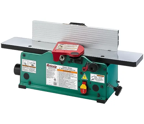 Grizzly benchtop jointer with green body, black tables, and red safety features