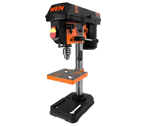 A WEN brand benchtop drill press with an orange and black color scheme, featuring an adjustable table and a visible chuck and bit