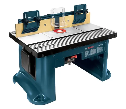 A Bosch benchtop router table with a blue base, adjustable fence, and clear dust collection port