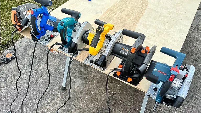 Five track saws on a plank, prepared for a budget-friendly comparison review