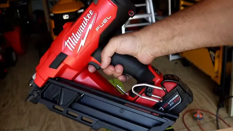 Person holding Milwaukee M18 FUEL