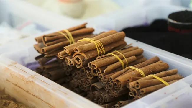 gathering the cinnamon sticks and store them in an airtight container to preserve their flavor and aroma