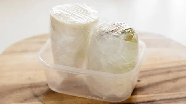 wrap each radish in plastic wrap and store them in a box in a cool, dark place