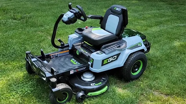 Modern EGO lawnmower on a lush green lawn.