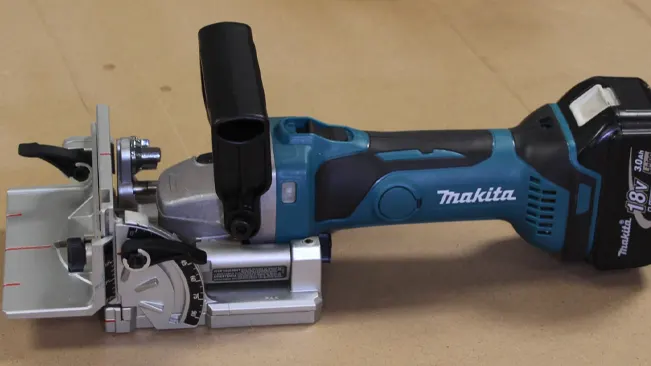 Makita cordless biscuit joiners on a wooden surface