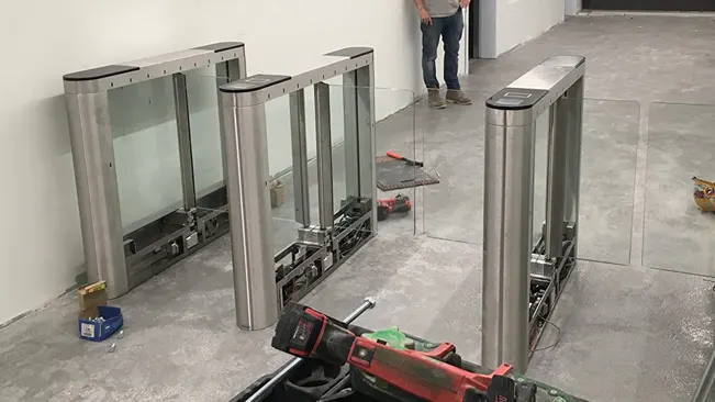 Installation of modern security turnstiles in a building