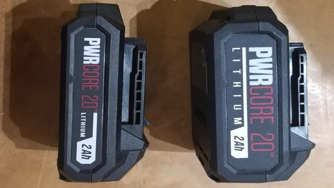 Two PWR CORE 20 Lithium batteries on a floor