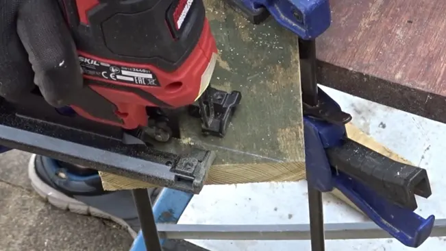 Person using a jigsaw for woodworking
