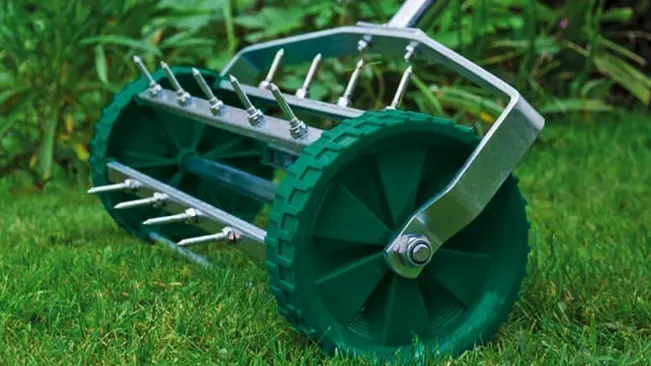 Manual lawn aerator on a lush green lawn in a garden setting
