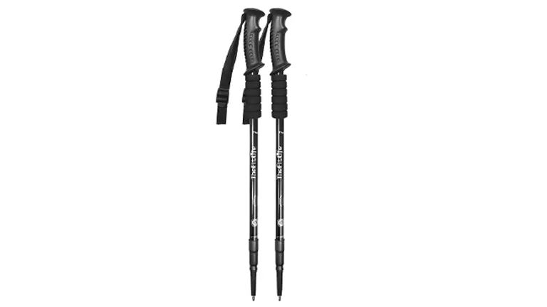 Pair of black adjustable High Stream Gear trekking poles with ergonomic foam grips and wrist straps, set on a white background.
