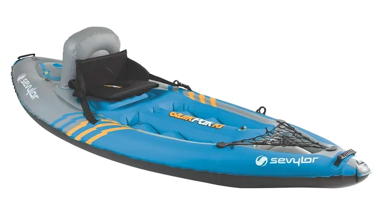 Inflatable Sevylor kayak in blue and grey with a high-back black seat and storage net, designed for single-person use, including visible brand markings and a streamlined shape.