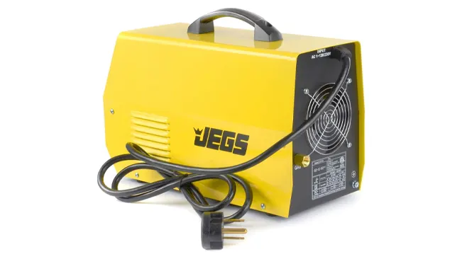 JEGS yellow plasma cutter with a cooling fan and electrical cord, side view.
