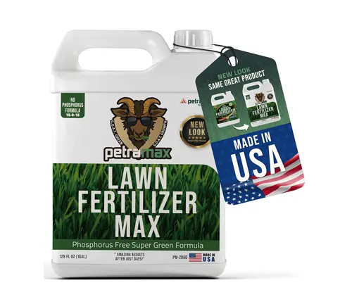 Jug of Petromax Lawn Fertilizer Max, phosphorus-free super green formula, with a tag noting 'New Look, Same Great Product' and a 'Made in USA' label.