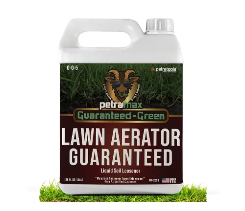 Jug of Petromax Lawn Aerator Guaranteed-Green, a liquid soil loosener, with a 0-0-5 formula, boasting 'Grass has never been this green' on the label.