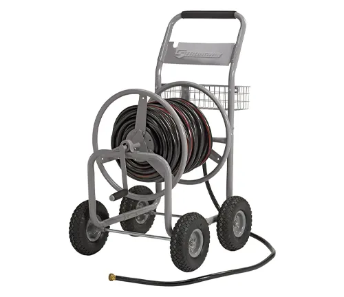 Four-wheeled hose reel cart with a sturdy gray frame, black hose, and a small storage basket, set against a white background.