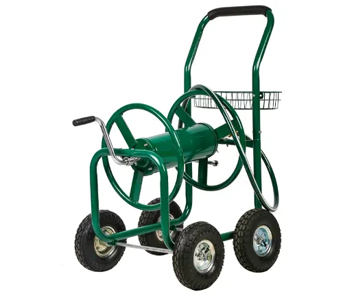 Green four-wheeled hose reel cart with a storage basket and sturdy pneumatic tires.