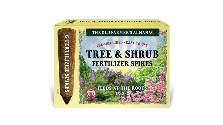 Box of The Old Farmer's Almanac Tree & Shrub Fertilizer Spikes, labeled as 'Pre-measured - Easy to Use,' with a 13-3-3 nutrient ratio and 'Feeds at the Roots' claim, including 6 fertilizer spikes.