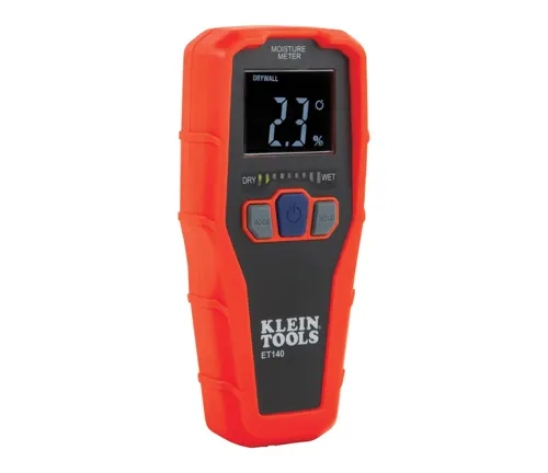 An orange and black Klein Tools ET140 pinless moisture meter isolated on a white background, with a digital display reading 2.1% moisture content.