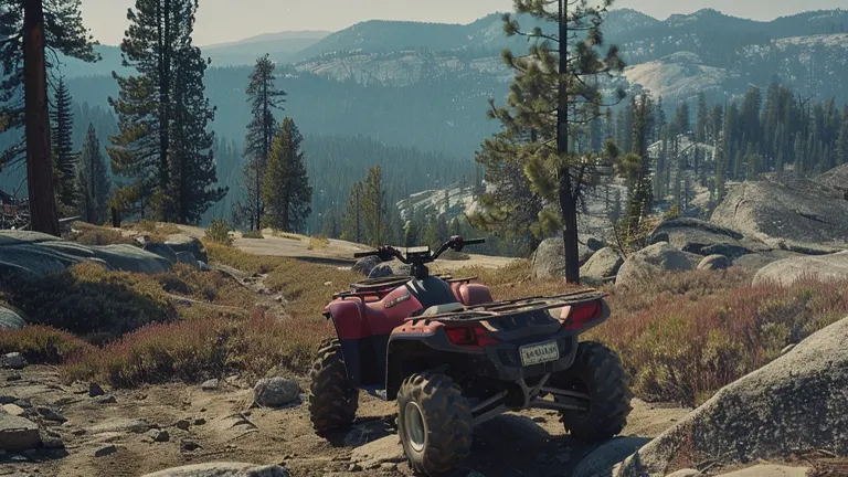 A red ATV parked on a rocky mountain trail with pine trees and a clear blue sky in the background.
