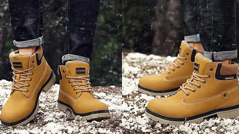 A side-by-side comparison of a pair of tan work boots. The left image shows one boot from the side, and the right image shows both boots from a slightly angled front view. The person is standing amidst fallen leaves, suggesting an autumn or winter scene. Snowflakes can be seen falling in the background.
