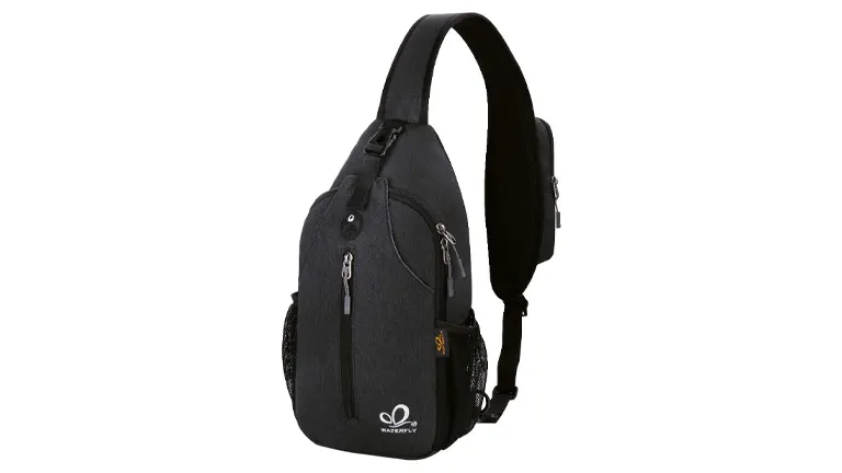A black WATERFLY crossbody sling backpack with a single padded strap, featuring multiple zippered compartments, a side mesh pocket, and the WATERFLY logo on the front. It's a compact and functional bag suitable for light travel, outdoor sports, or daily use.
