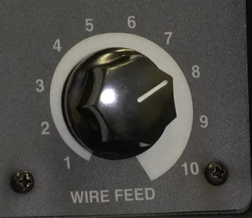 Wire feed control knob set to 5 on an Ironton 125 Flux-Cored Welder.
