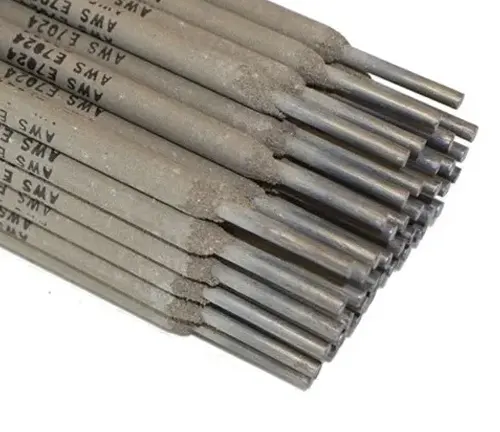 A stack of welding electrodes with grey flux coating and text 'AWS 7018' visible on the side.