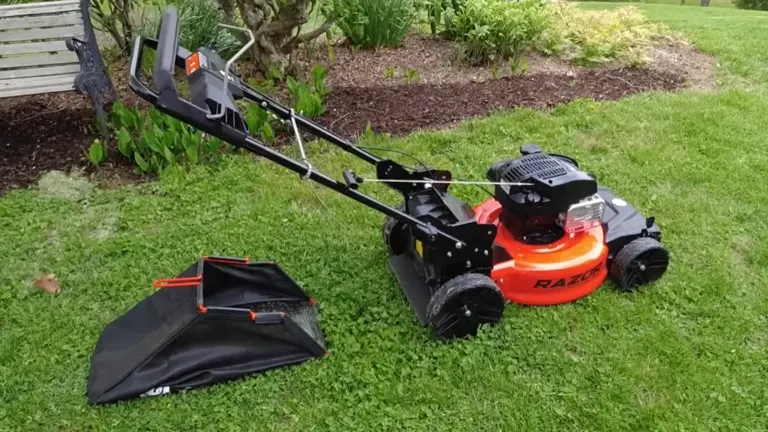 Ariens Razor 21 Mower sitting on the backyard with bagging system in the back
