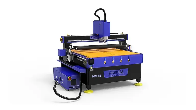 Phantom CNC router with a blue and yellow body and a wooden panel on the machine bed