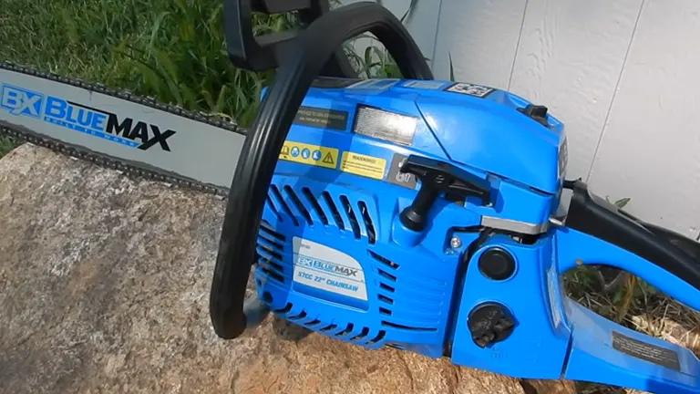 Blue Max 57cc Chainsaw sitting on the rock 