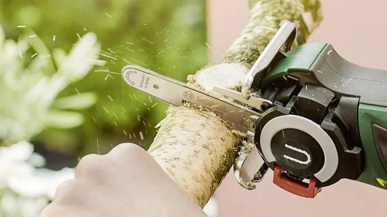 Bosch Nano Mini Chainsaw cutting a big branch