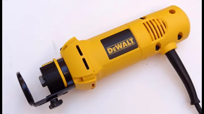 DEWALT DW660 rotary tool with a cutting wheel attachment, in yellow and black.