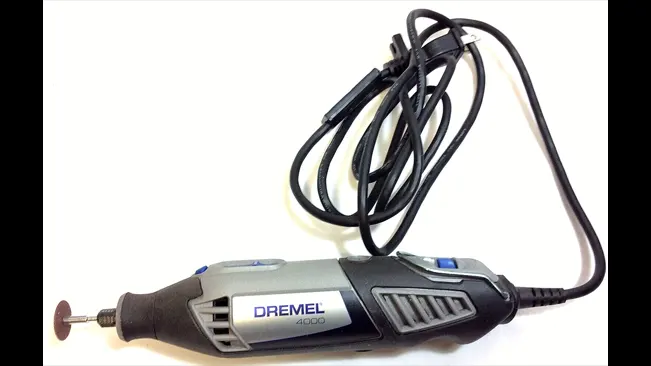 Dremel 4000 rotary tool with an attached cutting disc and power cord, in gray and black.