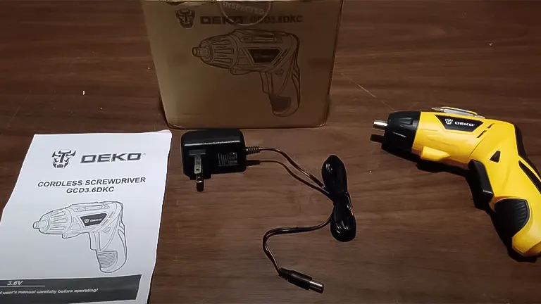 DEKOPRO 3.6V cordless screwdriver with charger, manual, and original box