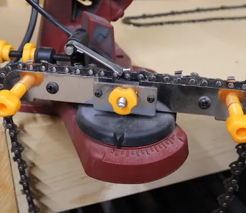 Chainsaw chain laying in the  Harbor Freight Chainsaw Sharpener