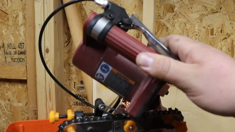 Person trying the Harbor Freight Chainsaw Sharpener Brake