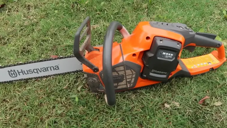 Husqvarna 540i XP Chainsaw laying on the grass