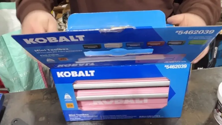 Person Unboxing the Kobalt Mini Pink Drawer Steel Tool Box