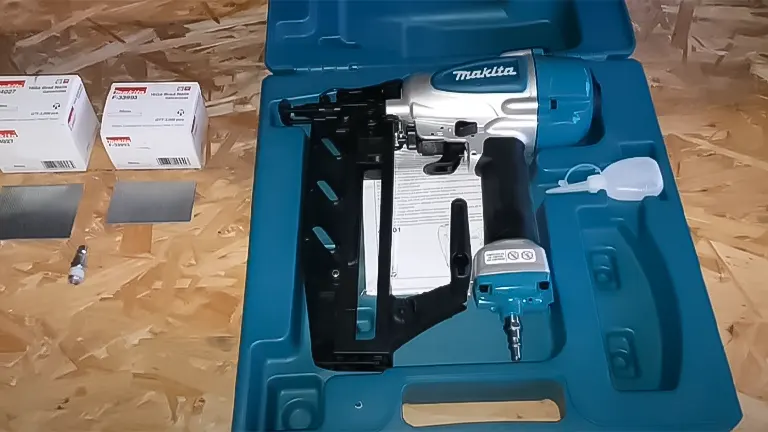 Makita AF601 16 Gauge Finish Nailer displayed in its case with accessories and boxes of nails