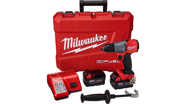 Milwaukee M18 FUEL hammer drill set with drill, two batteries, charger, handle, and wrench in front of a red case