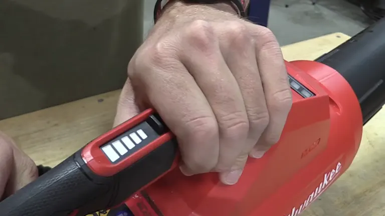 Person holding Milwaukee M18 Blower