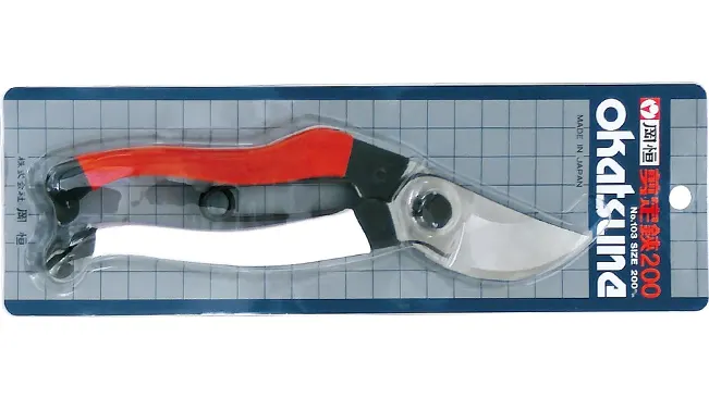Okatsune 103 Bypass Pruners in packaging on a blue background