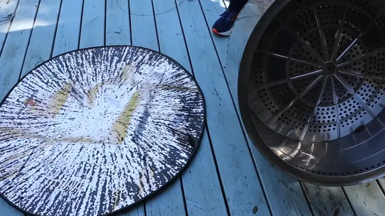 Person puts Fireproof Mat before putting Solo Stove in the deck