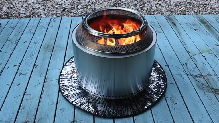Solo Stove in action sitting the wooden deck 