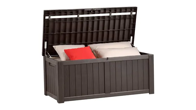 A dark brown YITAHOME 120 Gallon outdoor storage deck box with cushions inside.