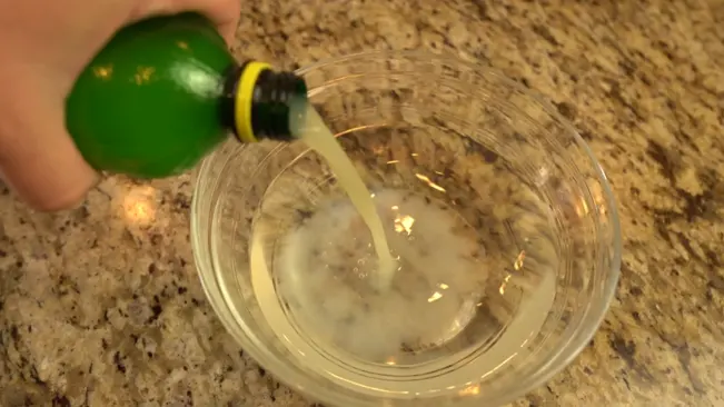 Pouring lemon juice