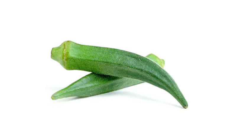 Two fresh green okra pods displayed on a white background.