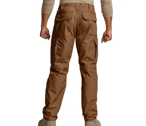 Rear view of a person wearing brown outdoor hiking pants with multiple cargo pockets, showcasing a practical and durable design suitable for trekking or casual outdoor activities.